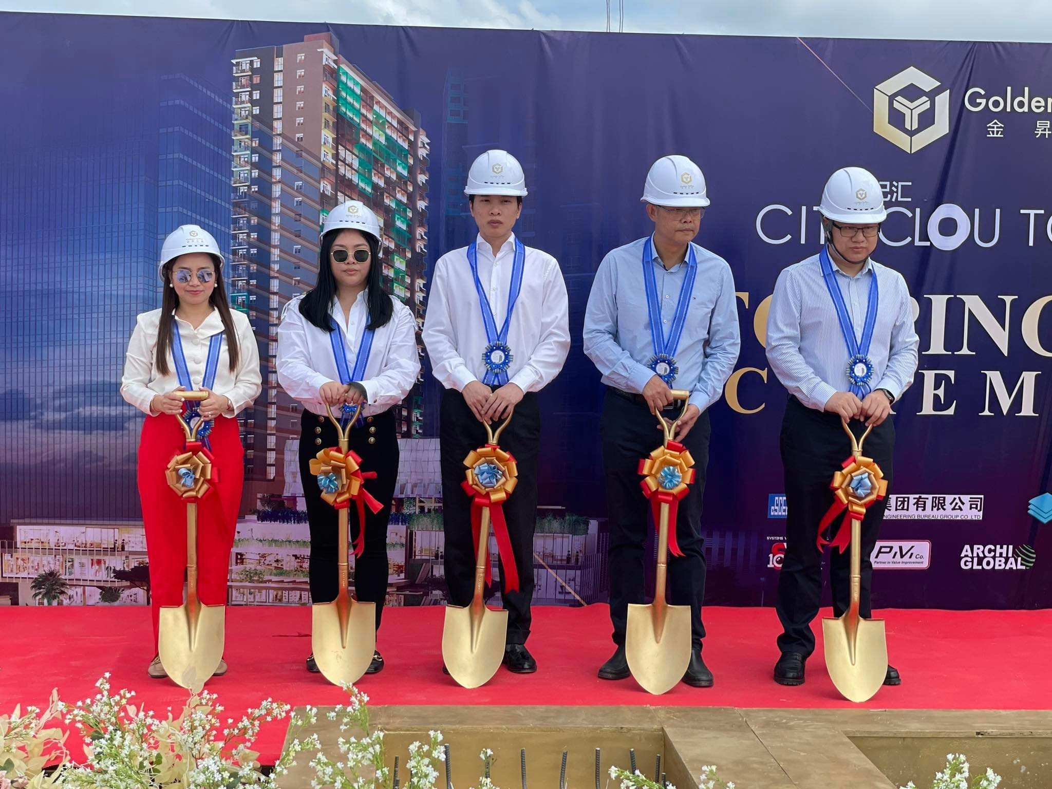 Golden Topper tops off second tower in City Clou